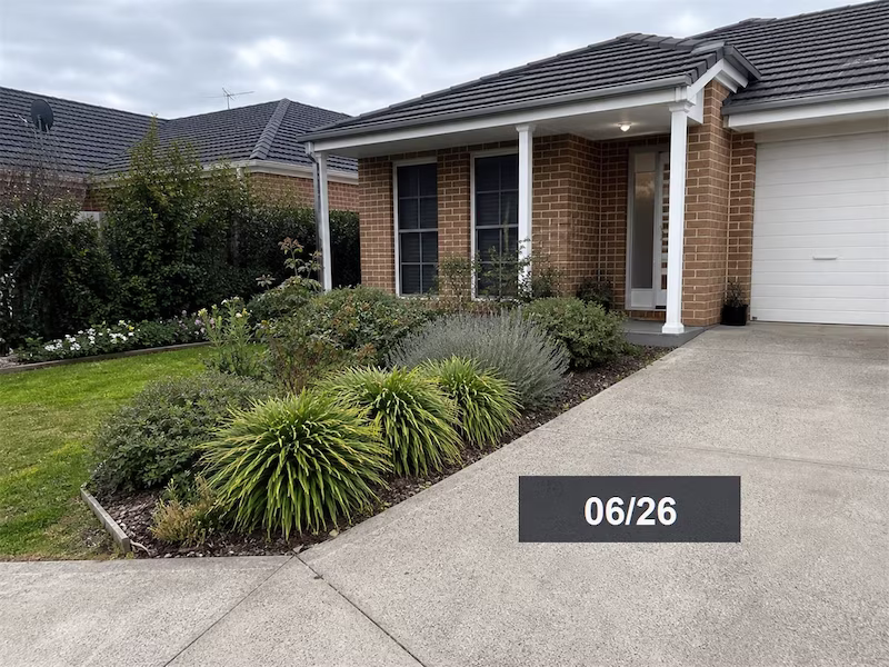 Property photo with an authorized date stamp